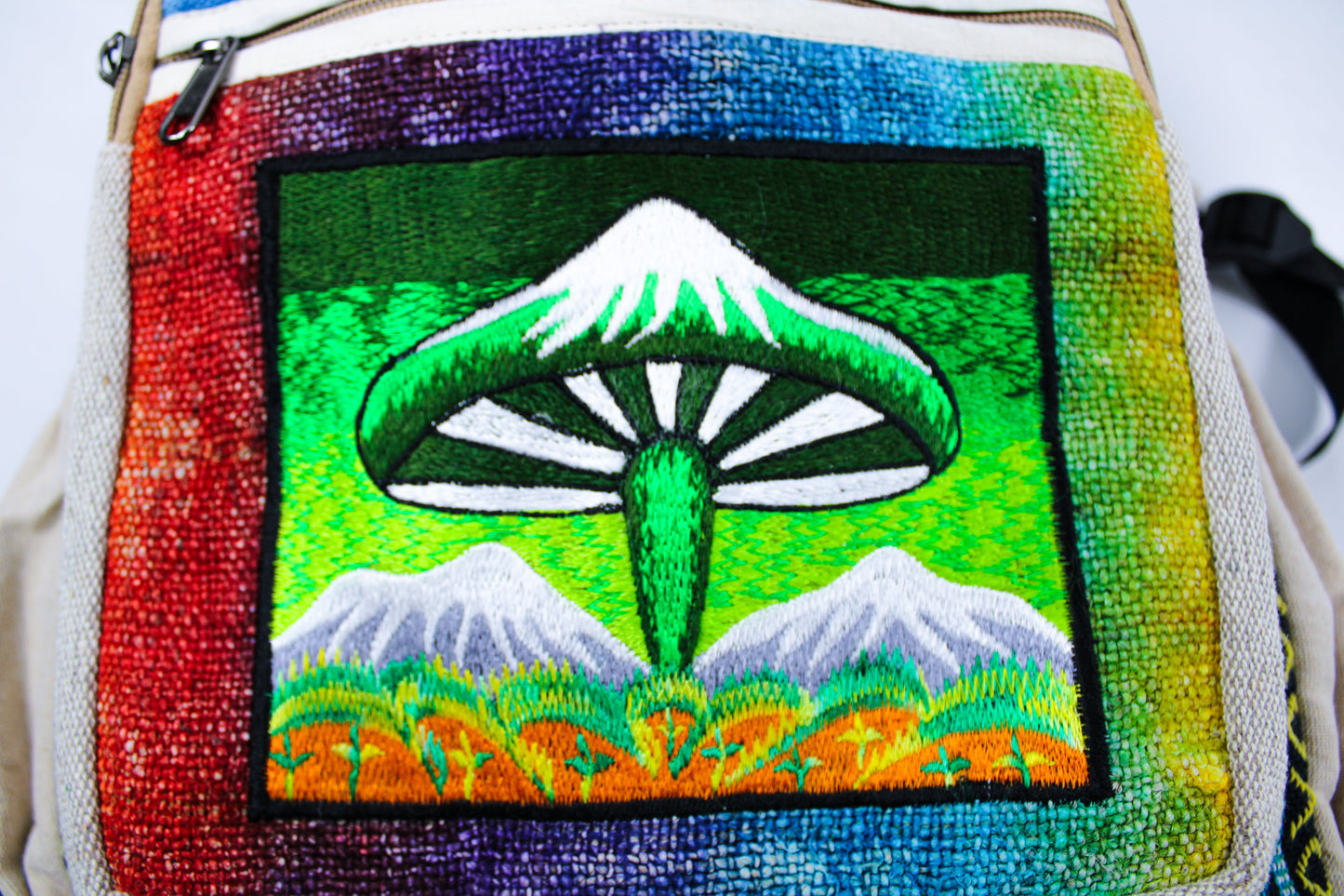 Full-size hemp backpack, beautifully embroidered with a serene mountain valley and whimsical mushroom